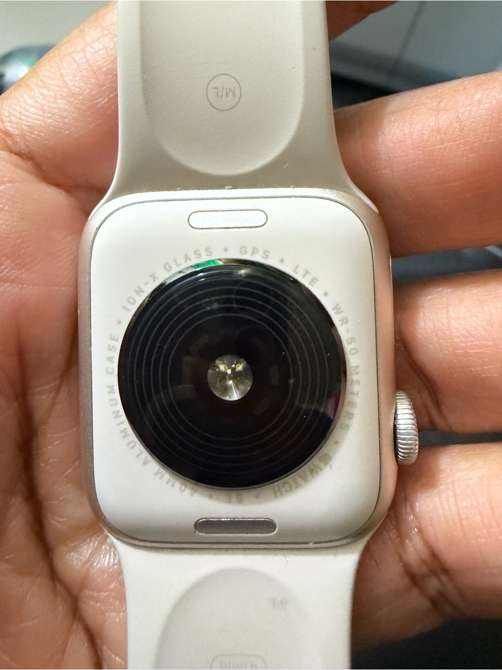 Smartwatch with Tan Silicone Band and Magnetic Charger - Picture 5 of 6